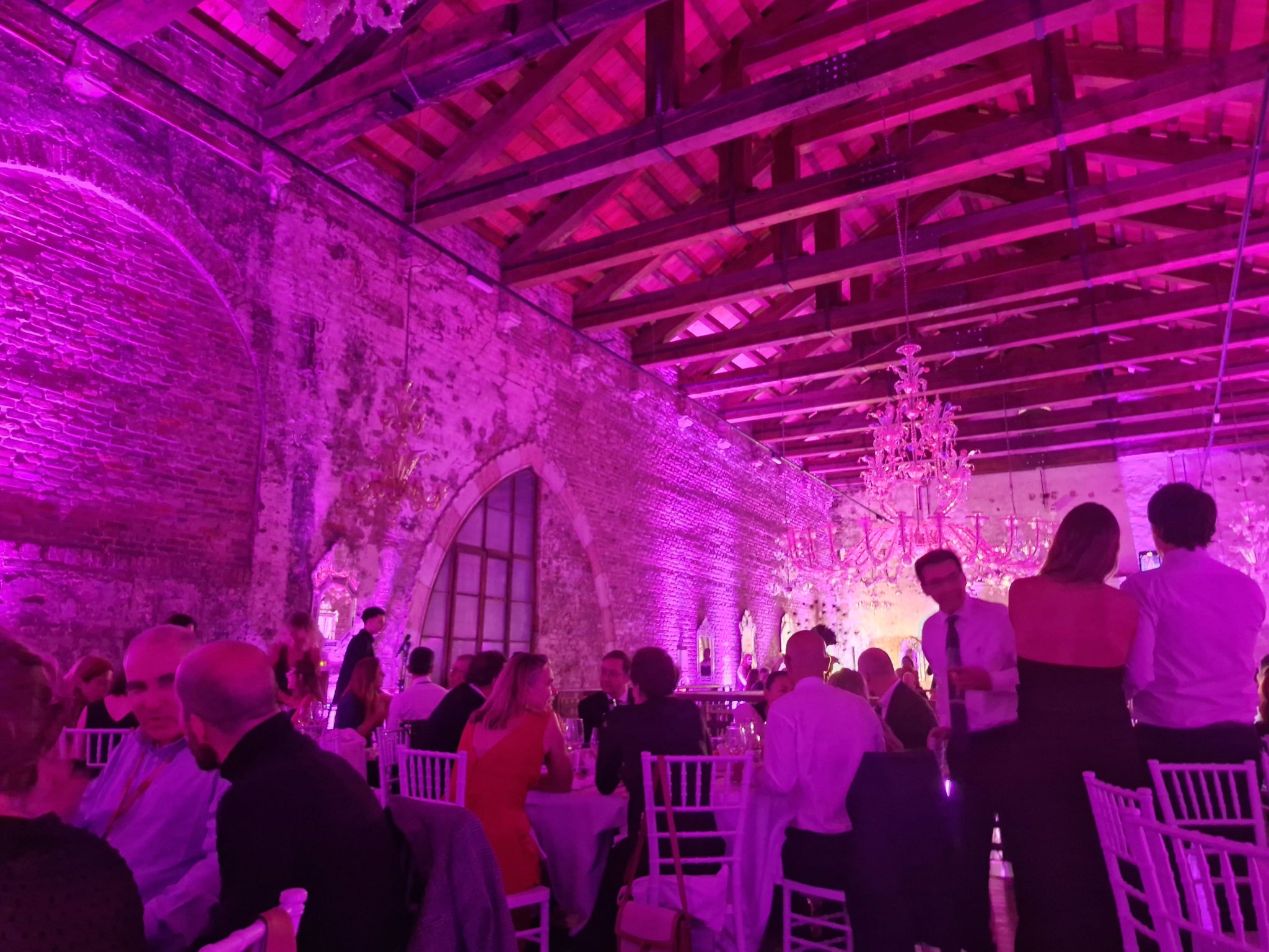 Elegant Venice reunion venue with purple lighting